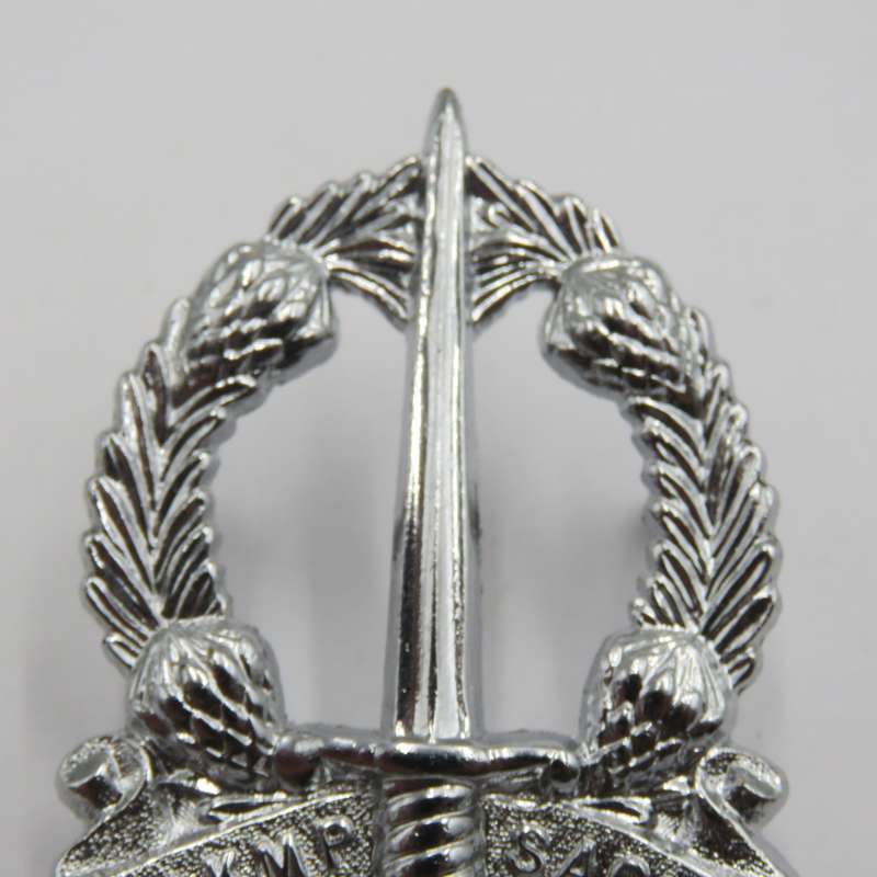 Lot of 2 different SA Corps of Military Police cap badges