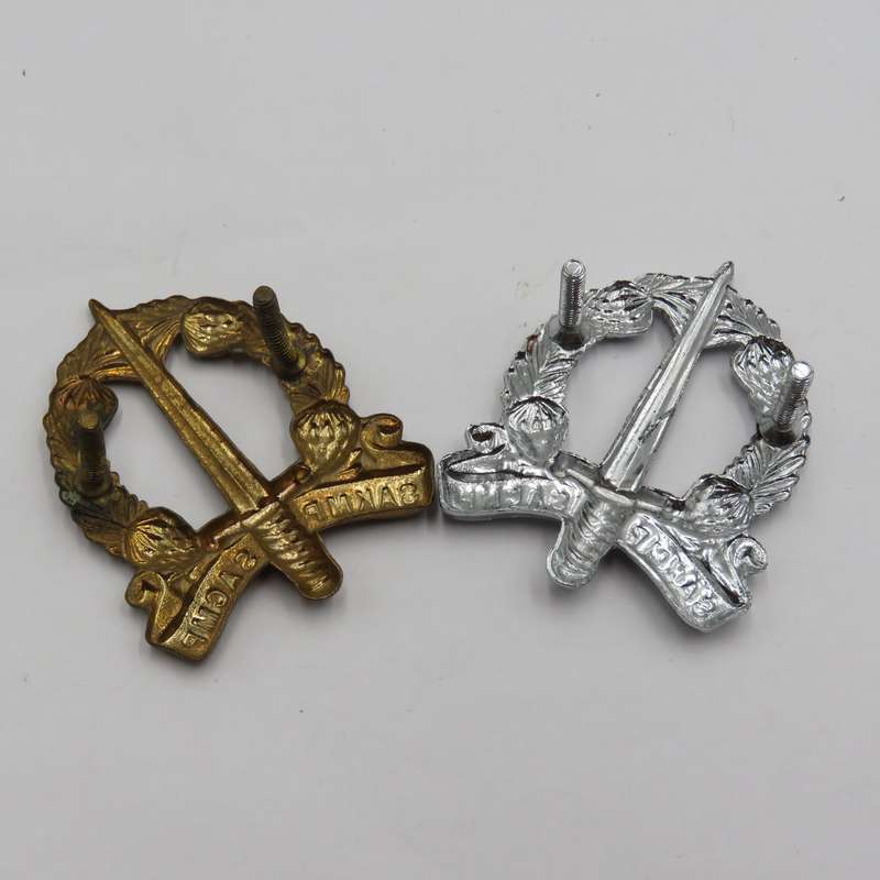 Lot of 2 different SA Corps of Military Police cap badges