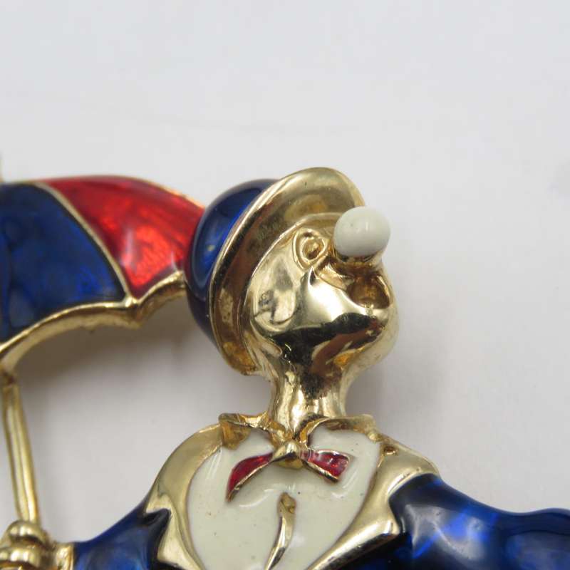Vintage gold colour with enamel clown brooch