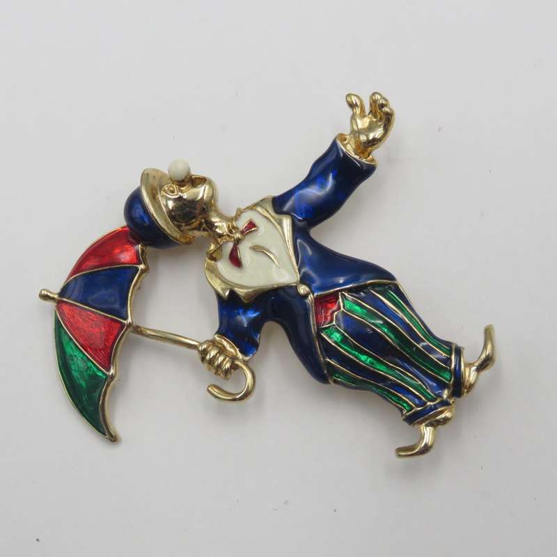 Vintage gold colour with enamel clown brooch