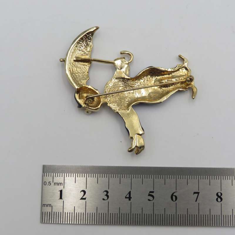Vintage gold colour with enamel clown brooch