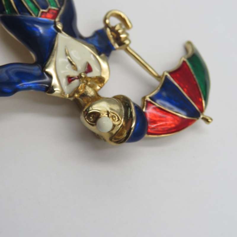 Vintage gold colour with enamel clown brooch