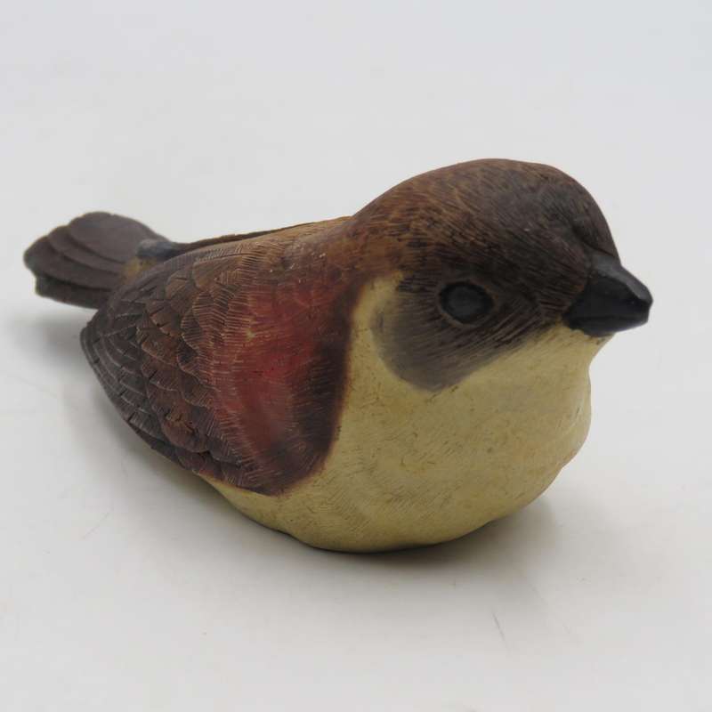 Feathers Cape White eye figurine in box