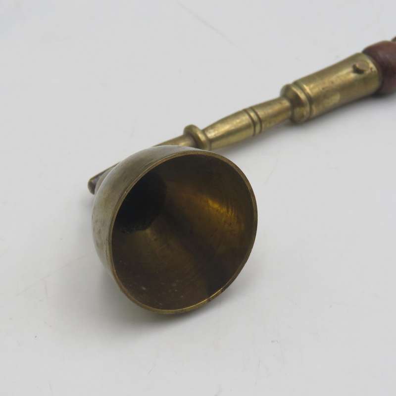 Vintage brass and wood candle snuffer