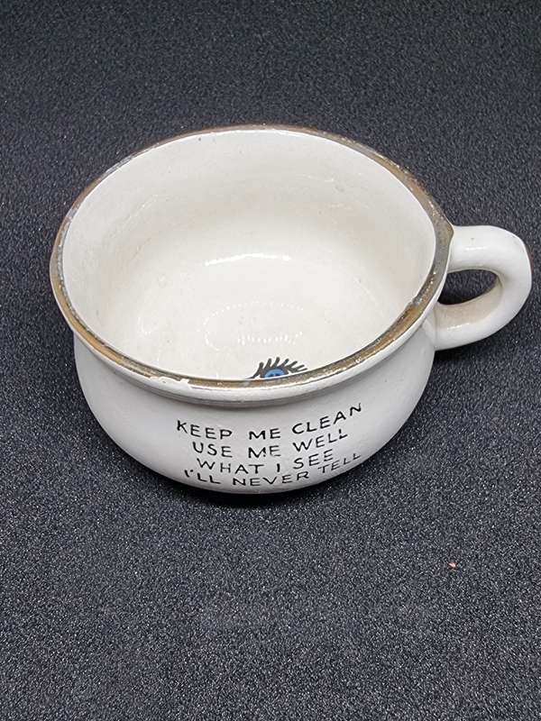 Vintage miniature cup with eye