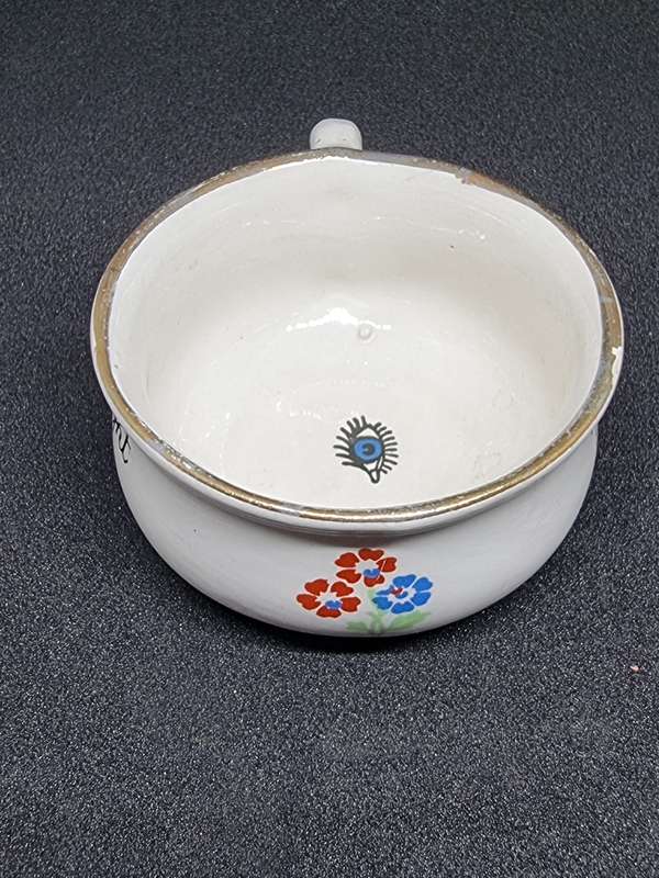 Vintage miniature cup with eye