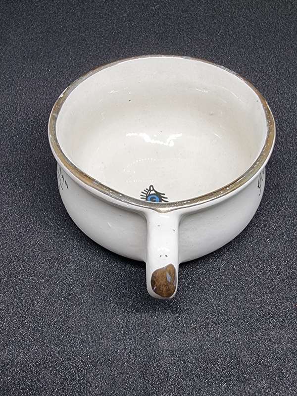 Vintage miniature cup with eye