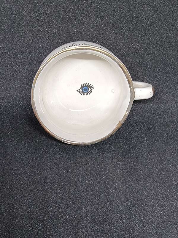 Vintage miniature cup with eye
