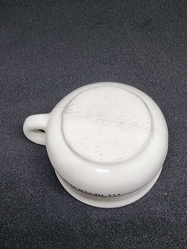 Vintage miniature cup with eye