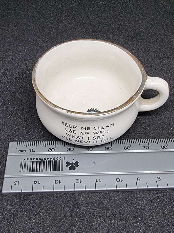 Vintage miniature cup with eye