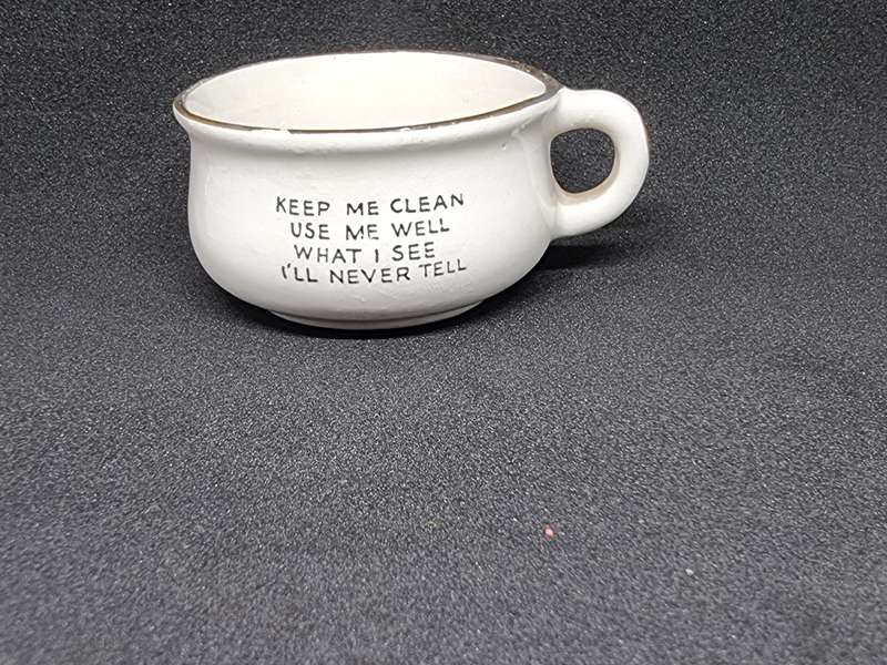 Vintage miniature cup with eye