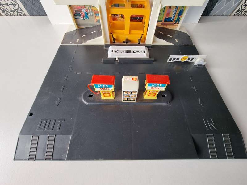 Vintage 6 Story Shell Parking Garage with Gas Station and Elevator