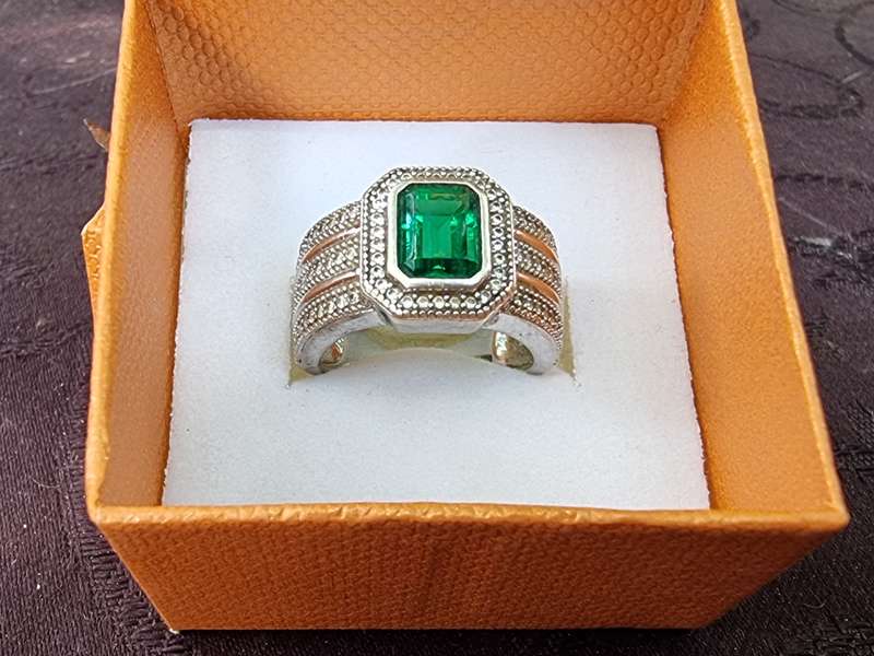 "EMERALD" CZ 925 Sterling Silver Ladies Dress Ring. ( Genuine Silver. )