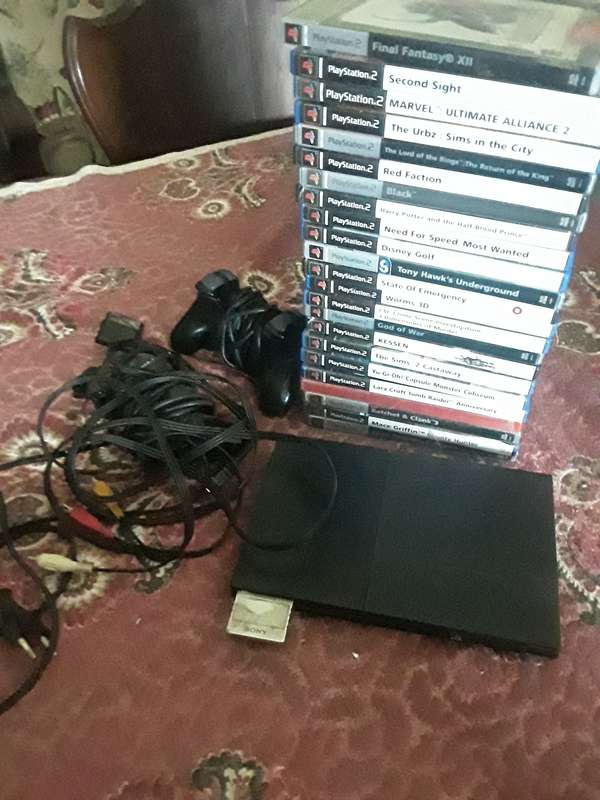 Playstation 2 bundle auction + Huge Collection of games