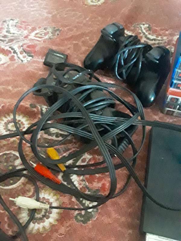 Playstation 2 bundle auction + Huge Collection of games