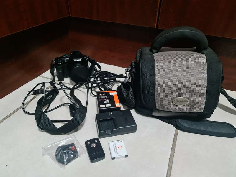 Pentax x70 Camera with accessories