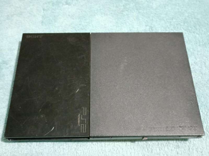 PS2 + 2 x Controllers + 19 Games + Extras