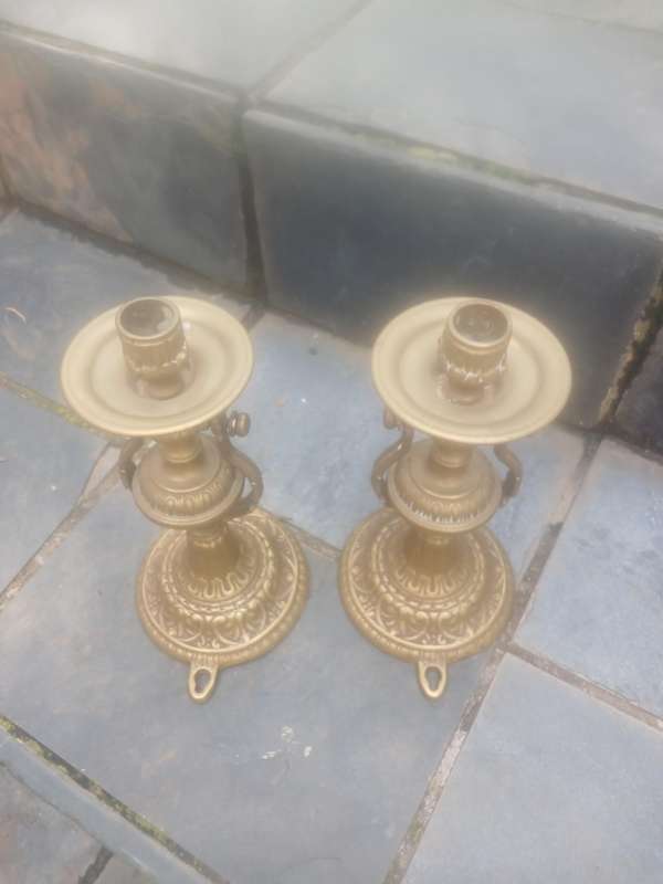Pair of gimbal style ships brass candlesticks.