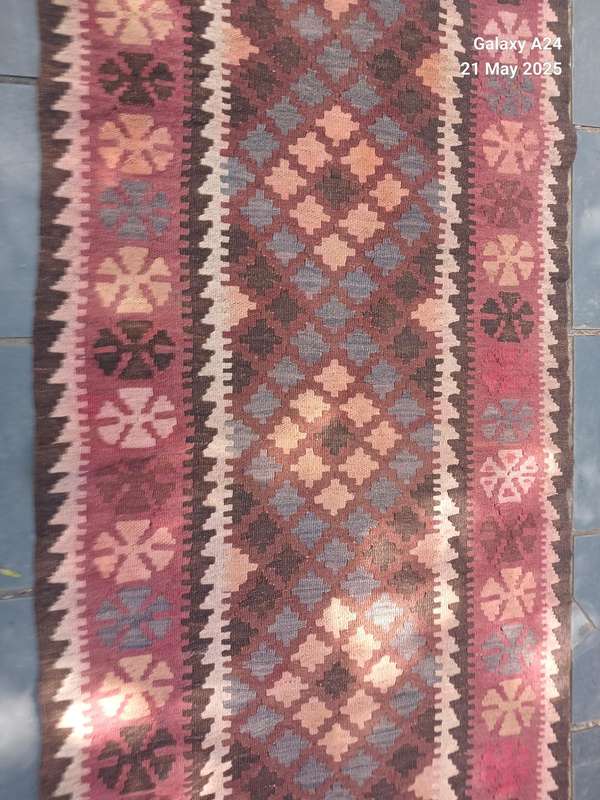 A hand knotted Kelim runner