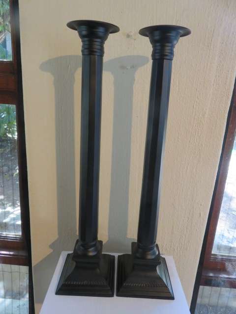 Large pair of black anodised candlesticks