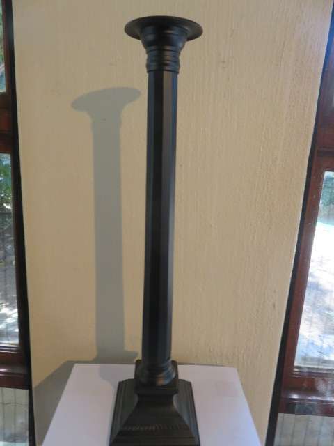 Large pair of black anodised candlesticks