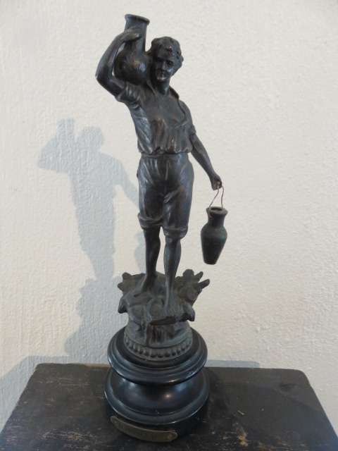 Le Porteur D'eau spelter figure of a man carrying water