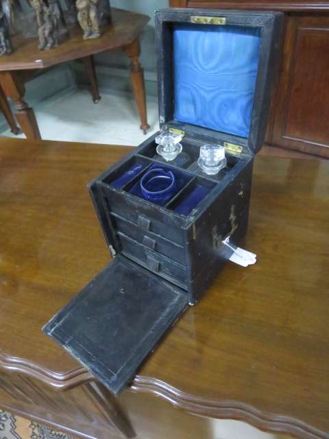 Victorian jewelry box with glass perfume bottles