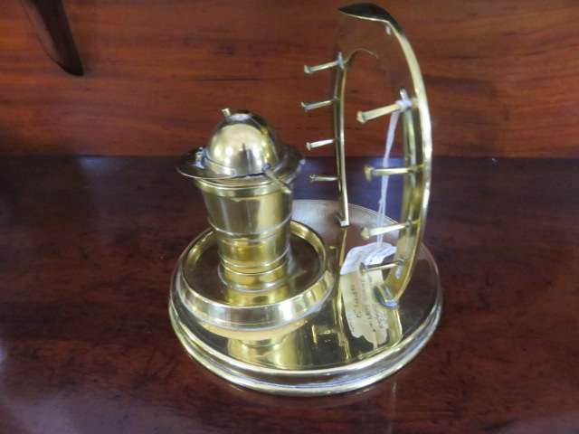 Victorian  brass inkwell and pen stand.