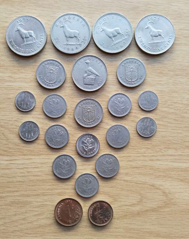 Rhodesia collection of 23 old coins. Some Good. (5 cents seems to be struck off centre)