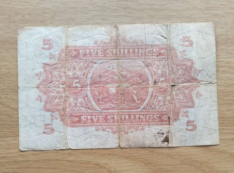 Nairobi 1st June 1939 East Africa Currency Board Five Shillings. (Small tears) Rare note.