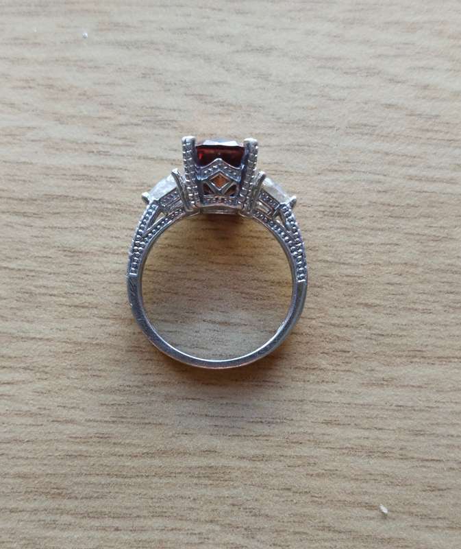 Beautiful Sterling silver ladies ring with copper colour semi precious Stone and other Stones. 18mm