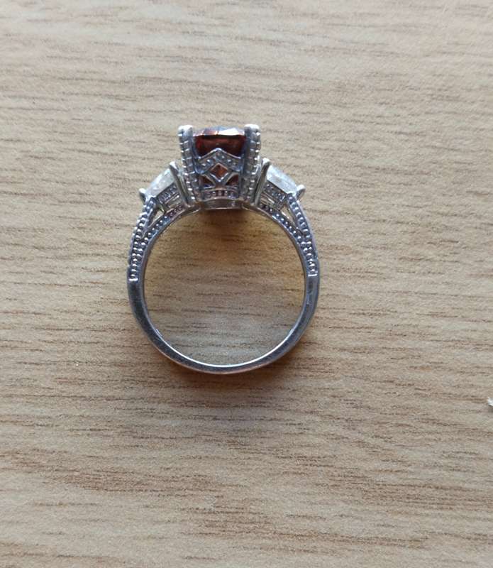 Beautiful Sterling silver ladies ring with copper colour semi precious Stone and other Stones. 18mm