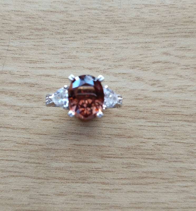 Beautiful Sterling silver ladies ring with copper colour semi precious Stone and other Stones. 18mm