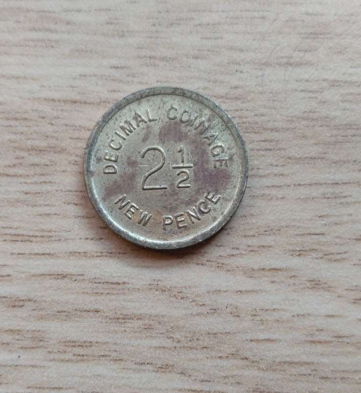 Bell Fruit sixpence token.