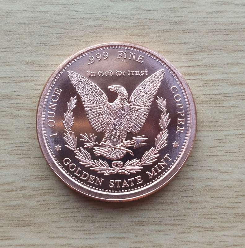 America 1 OZ .999 Fine copper Morgan Dollar.