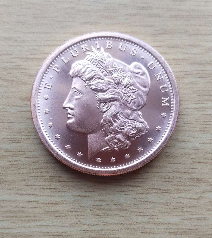 America 1 OZ .999 Fine copper Morgan Dollar.