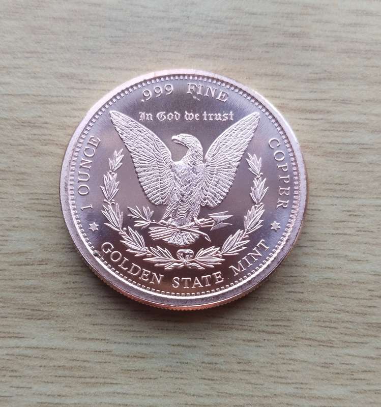 America 1 OZ .999 Fine copper Morgan Dollar.