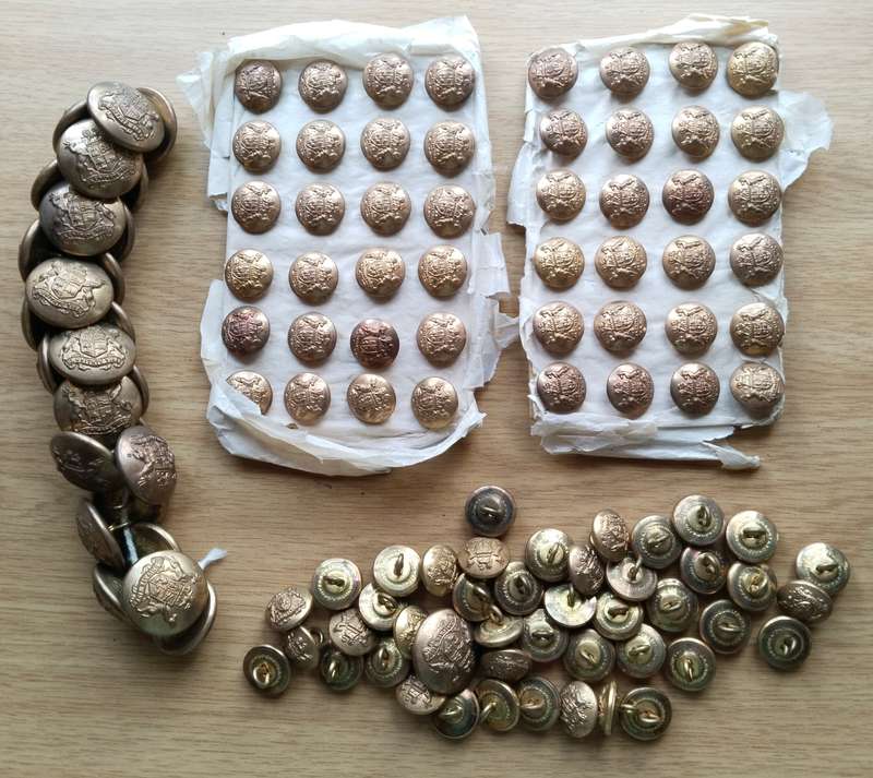 Large collection of old military buttons.