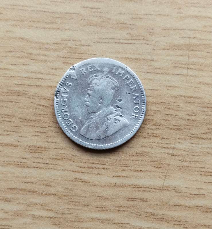 South Africa 1923 Silver Sixpence. Slightly bend.