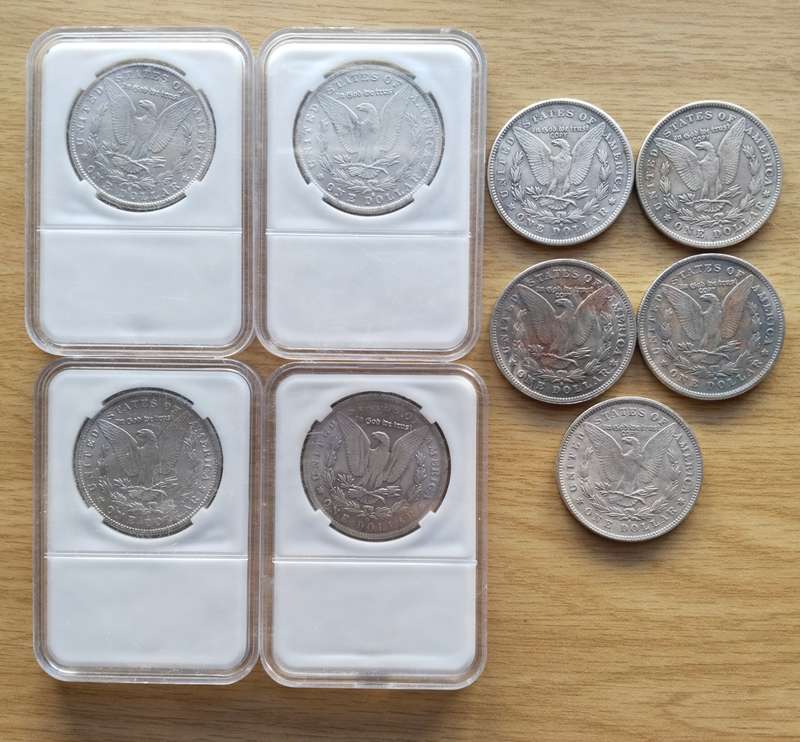 America collection of 9 ( not real ) Morgan Dollar. One bid takes all.