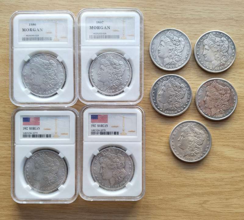America collection of 9 ( not real ) Morgan Dollar. One bid takes all.