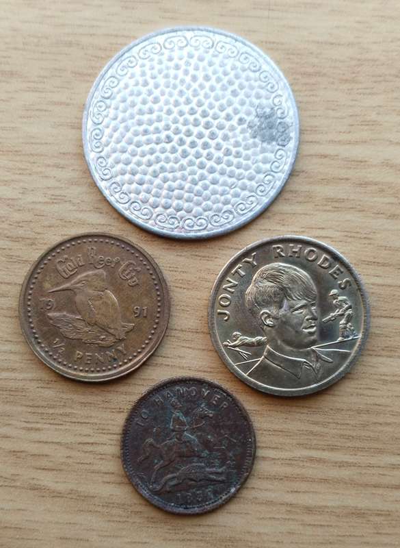 Collection of 4 old tokens.