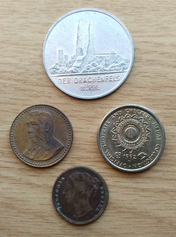 Collection of 4 old tokens.