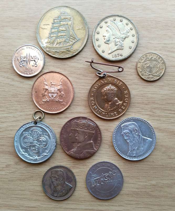 Collection of 11 old Tokens. Some good.
