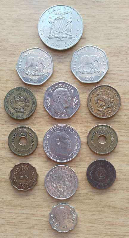 Collection of 13 old coins from around the world. Some good.