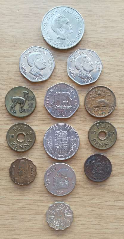 Collection of 13 old coins from around the world. Some good.