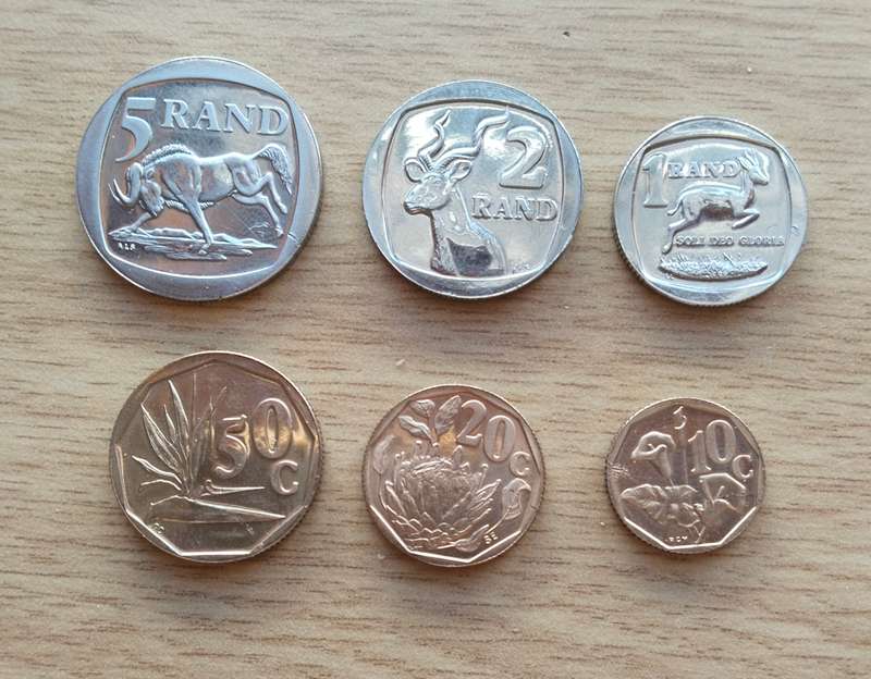 South Africa 1994 Proof coins. 50,20 and 10 cents where stuck to something.
