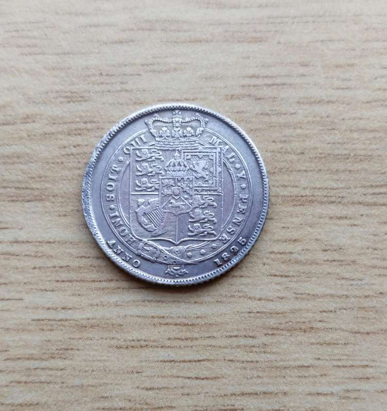 Great Britain 1825 King George 1111 Silver Sixpence. Good condition.