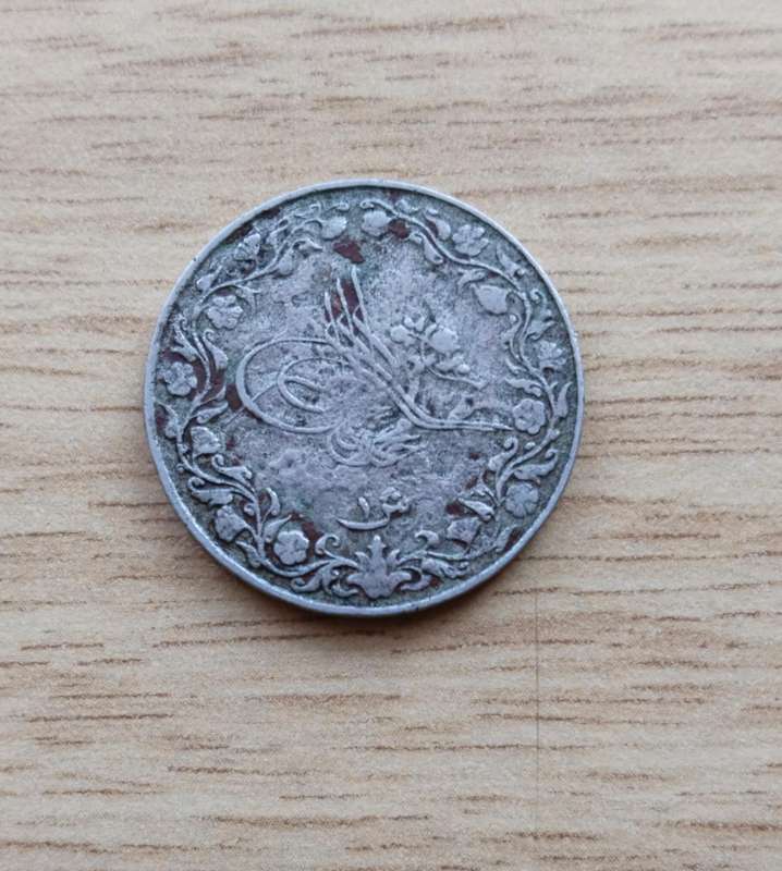 Old Egyptian coin. Not sure if it is Silver.