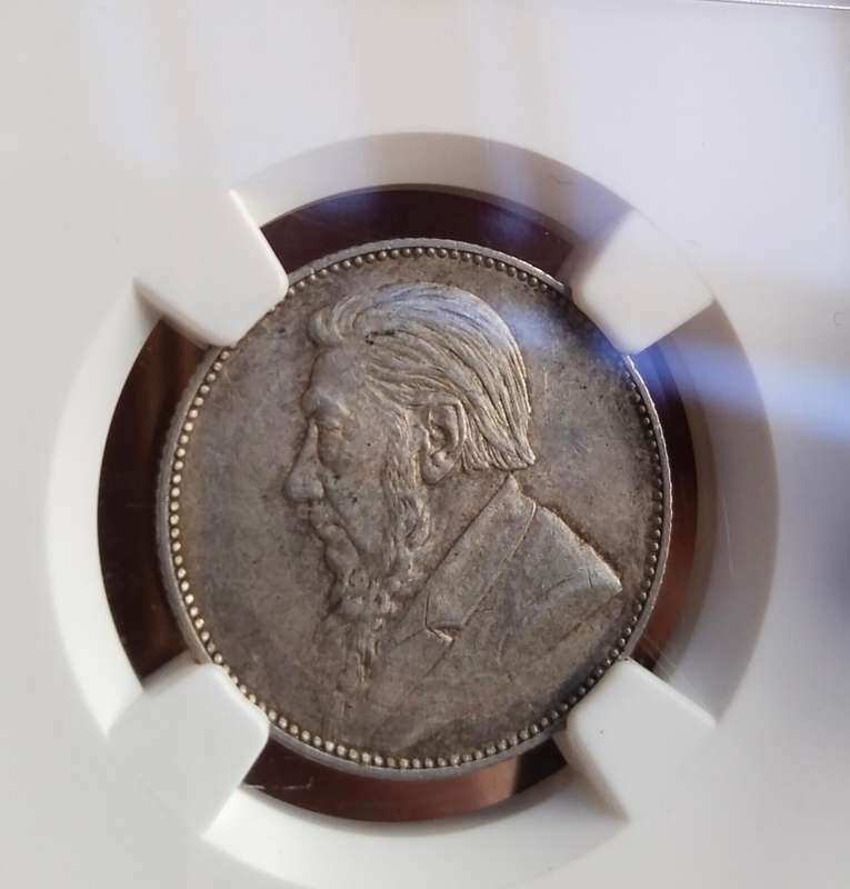 ZAR Paul Kruger 1897 NGC AU55 Silver Shilling.